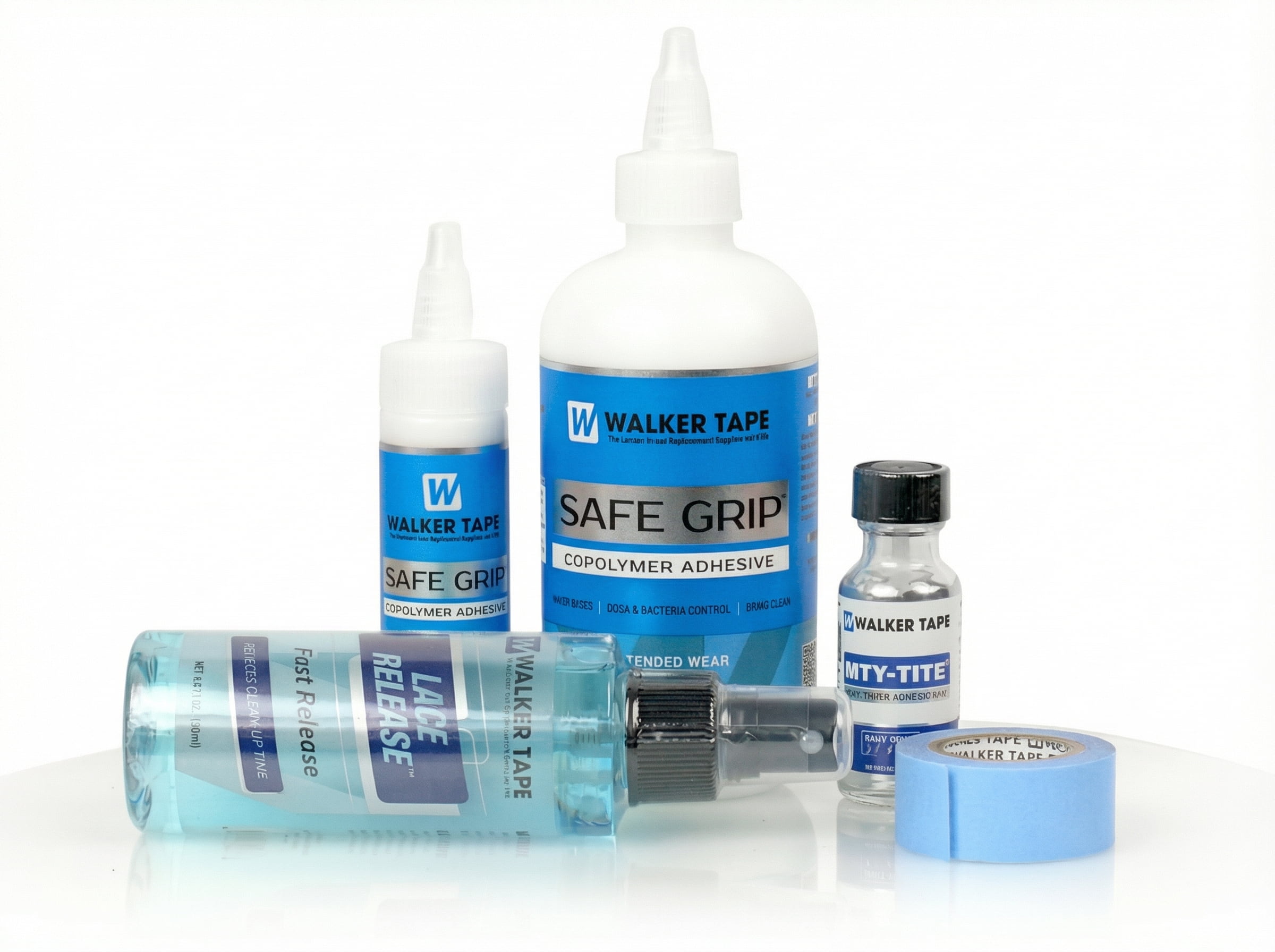 Zestaw produktów Walker Tape w&nbsp;niebieskich opakowaniach, w&nbsp;tym klej na&nbsp;bazie wody Safe Grip, płyn Lace Release do&nbsp;usuwania systemów siateczkowych i&nbsp;niebieska taśma.